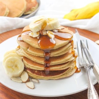 stack of almond flour banana pancakes with maple syrup