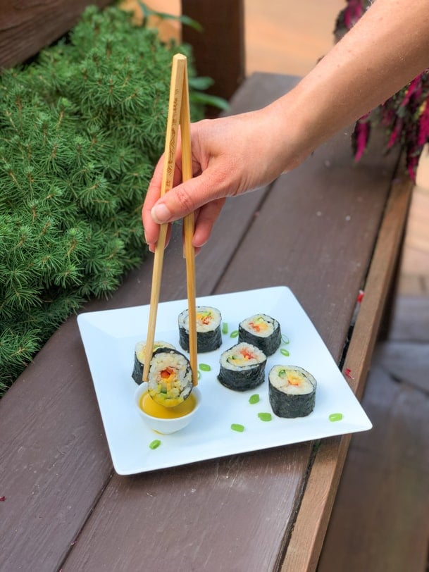 beefshi - sushi with roast beef, avocado, cucumber, cheddar cheese, red pepper, and mustard soy sauce