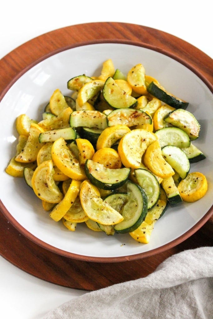roasted zucchini and squash slices in a shallow bowl