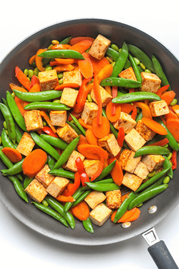 stir fry in a skillet with tofu and vegetables